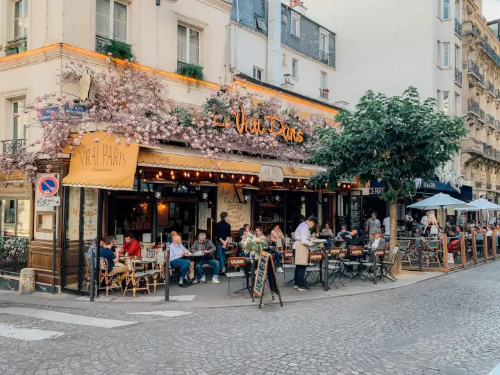 Enjoying French Food On A Terrace In France